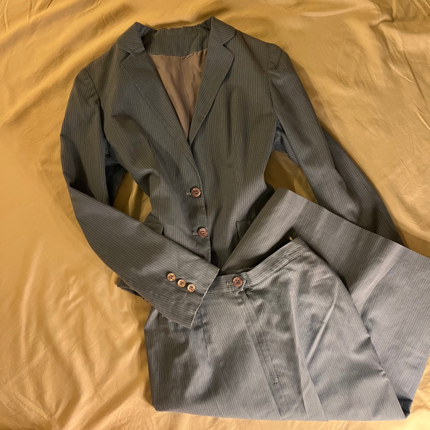 the Priscilla 70s pinstripe blue suit, size XS