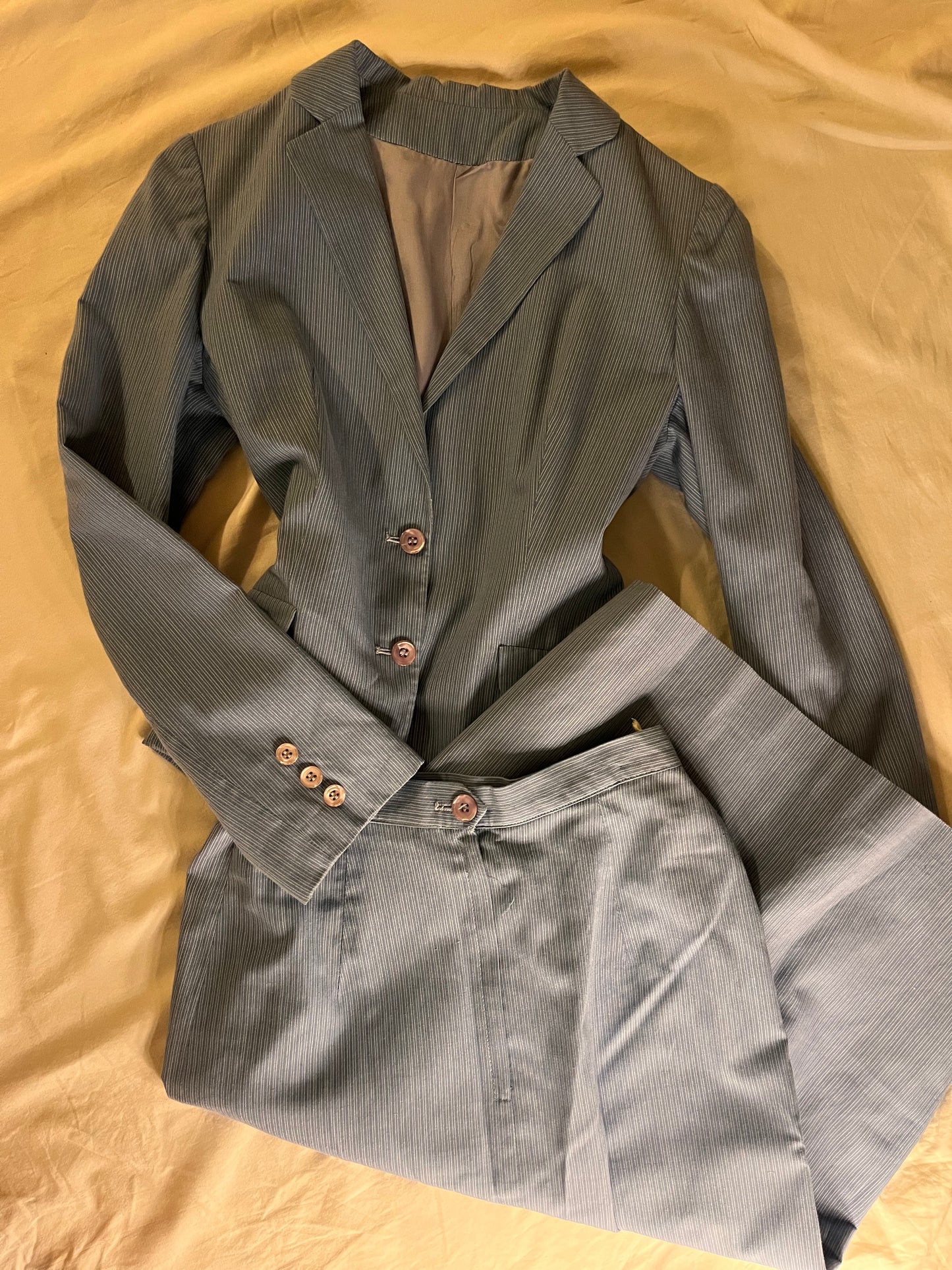 the Priscilla 70s pinstripe blue suit, size XS
